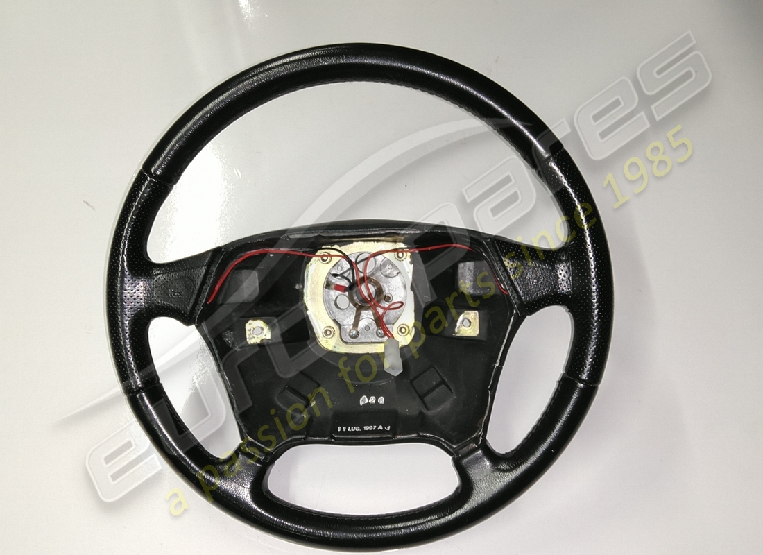 used ferrari steering wheel in black (can use 164249). part number 65846500 (1)